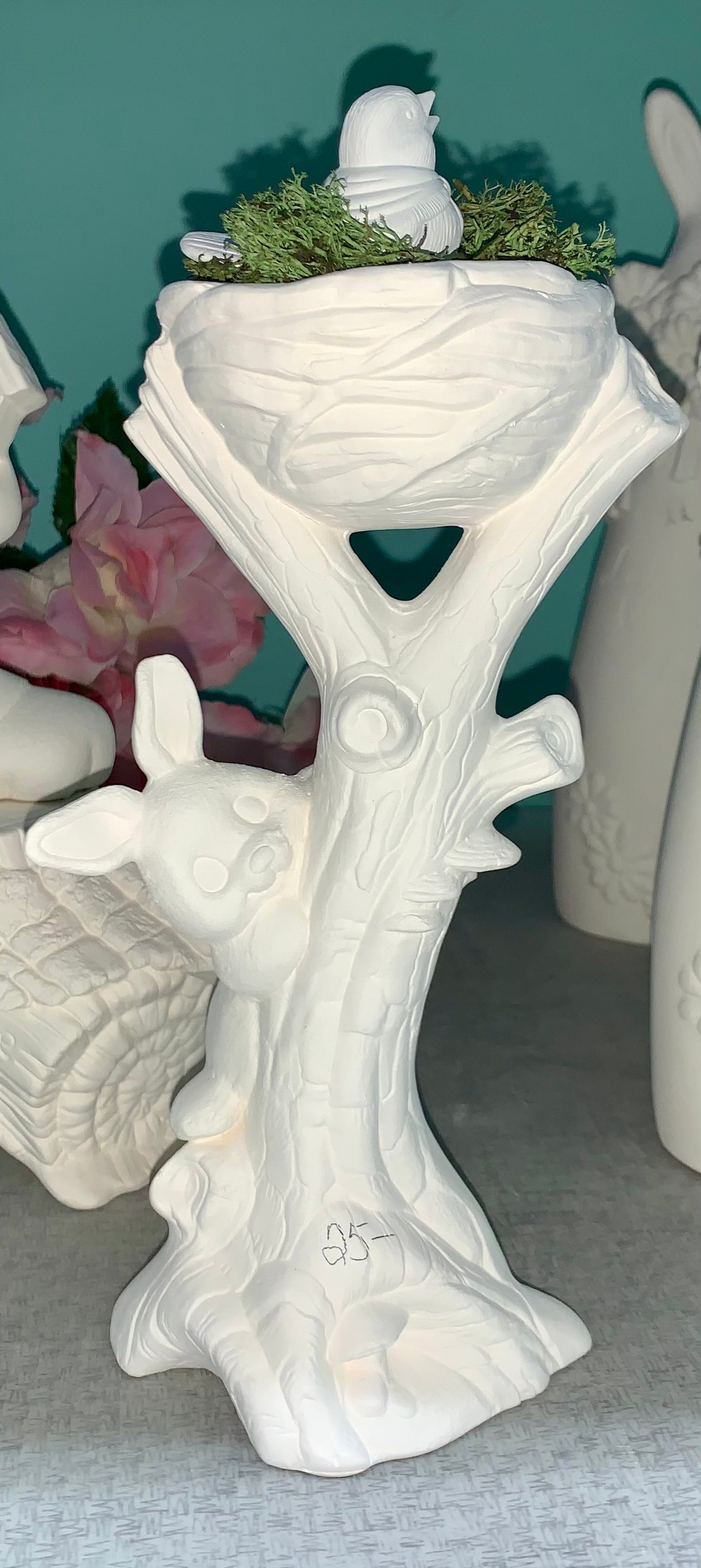 Bunny reaching with birds in nest set