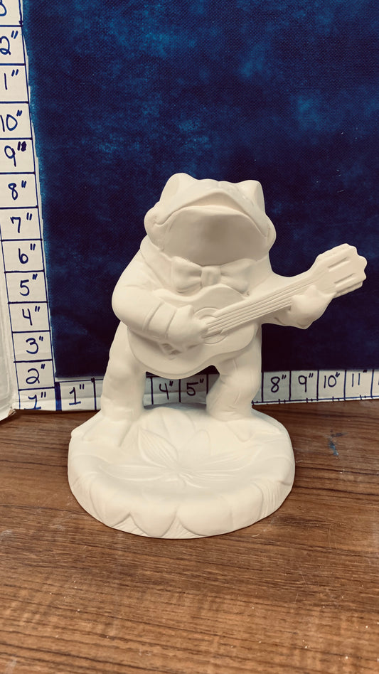 Frog playing guitar