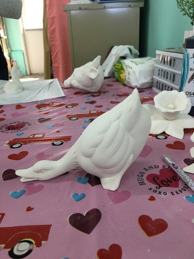 Duck w/head down