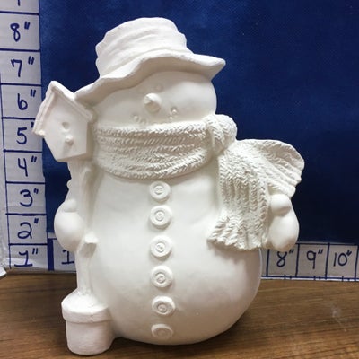 Snowman with birdhouse